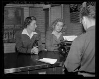 Actress Frances Farmer being booked by sheriff Vivienne Hassack Los Angeles, Calif., 1943