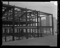 Know Your City No.127; Construction of steel framework of Los Angeles County Courthouse at 1st and Hill Streets, 1956