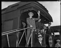 President Franklin D. Roosevelt and Eleanor Roosevelt greet a crowd from the back of the presidential train at Central Station, Los Angeles, 1935