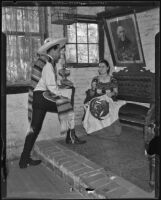 Evangeline and Publio Melendrez preparing for Mexican independence festivals, Los Angeles, 1935