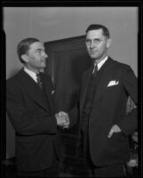 Municipal Court Judge Arthur Crum shakes hands with writer H. H. van ...
