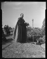 Bishop John J. Cantwell officiates at a graduation ceremony at Loyola University, Los Angeles, 1935