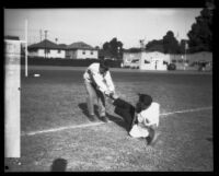 Young men in homecoming "brawl," University of Southern California, Los Angeles, 1928