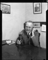 City Council President Boyle Workman using a telephone, Los Angeles, 1927