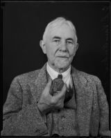 C. S. van Auken holding a Lusitania medal, Los Angeles, 1935