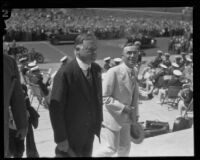 Herbert Hoover and George E. Cryer walk up City Hall steps, Los Angeles, 1928