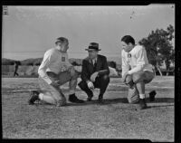 Dan Hill and Eric Tipton of the Duke Blue Devils with Coach Wallace Wade, Pasadena, 1938