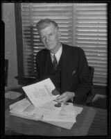 Dean Rockwell D. Hunt at his desk, Los Angeles, 1935