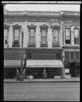 Whalen Curio Store and other shops on Spring Street in downtown Los Angeles, early 1930s