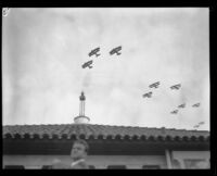 U.S. Army biplanes fly in formation at United Airport in Burbank, 1930