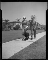 Mr. and Mrs. Anton and Teddy Fera von Horvath walking their dog, Los Angeles, 1936