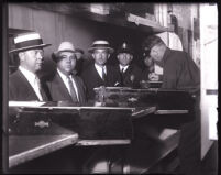 David H. Clark being booked at the police station, Los Angeles, 1931