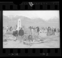 Japanese American Citizens League members clearing ground around Manzanar Shrine at Manzanar War Relocation Center in Calif., 1970