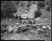 Chavez Ravine property owners examine bulldozed ruins