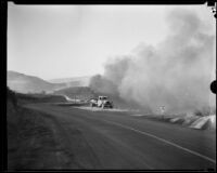 Smoke reaching the US 99 during the National Forest Inn fire, California, 1932