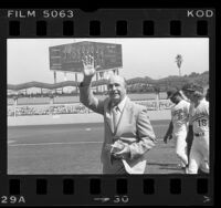 Los Angeles Dodgers' manager Walter Alston waving to fans during retirement ceremony at Dodgers' Stadium, Calif., 1976