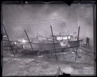 Burning boat at an auto show fire, Los Angeles, 1929