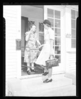 Florence Peters of the Visiting Nurse Association greets a patient, Los Angeles, 1946