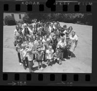 Entertainer Bob Hope surrounded by 53 extended family members at his home in Toluca Lake, Calif., 1973