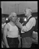 A.S. Judge Ray B. Schauer and F. P. Phillips getting ready for bar pageant, Los Angeles, 1935