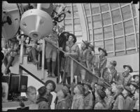 Dinsmore Alter shows a group of Arizona Boy Scouts the Zeiss refracting telescope at the Griffith Observatory, Los Angeles, 1935