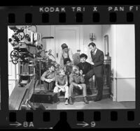 Actors Jack Klugman and Tony Randall meeting boys from Big Brothers of America on the set of "The Odd Couple," 1970