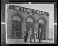 Harry Carr, Woodsworth Clum, Dr. C. G. Toland and the mayor in front of the Bird Cage Theatre, Tombstone, 1931