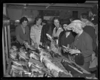 Dolores Beckett, Margery Teague and Jane Woodin at a rummage sale for Children's Hospital, Los Angeles, 1936