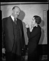 Marie Reynolds points an admonishing finger at Senator J. W. McKinley, Los Angeles, 1934