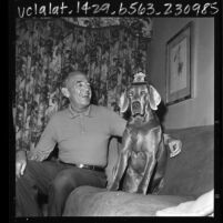 Los Angeles Police Chief William H. Parker with his dog, Lex, 1965