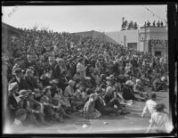 Rose Parade spectators in a grandstand along the parade route, Pasadena, 1930