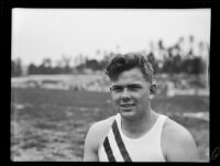 Joe Forbes, Occidental College track athlete, poses at Patterson Field during a track meet, Los Angeles, 1932