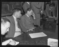Robert S. James, suspect in Lois Wright morals case and Mary Emma James murder case, and lawyer Samuel Silverman in court, Los Anglels, 1936