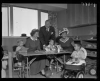 Deborah Kerr, Henri Jan Van Oosten, Nina Anderton, and pediatric patients, UCLA Medical Center, Los Angeles, 1956