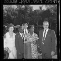 Uganda politician Basil K. Bataringaya and wife, Edith Mary with Mr. and Mrs. Frank Klock at Disneyland, 1964