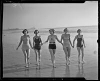 Mrs. W.R. Malcom, Elizabeth Scattergood, Mary McGeagh, Marcia Hammond, and Mrs. Calvin Wells Day (Esther Lynd Day Howard) walk on the beach, Los Angeles, circa 1935