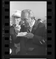 Close-up of President Lyndon Johnson eating a slice of cake at Camp Pendleton, Calif., 1967