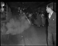 Protesters fleeing from tear gas during Los Angeles Railway strike, Los Angeles, 1934