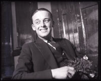 Prisoner E. Rand Becker grins on his wedding day, Los Angeles, 1920