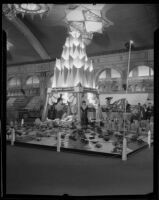 Woman stands with the San Joaquin County display at the Los Angeles County Fair, Pomona, 1932