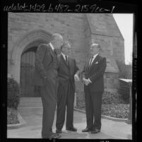 Actor Raymond Massey, playwright Clifford Odets, and Jack Warner during funeral for Jerry Wald in Glendale, Calif., 1962