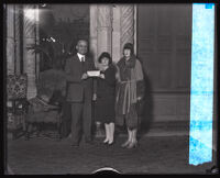 Ned R. Powley donates to Mrs. Walter Hubner and Mrs. Edmund Jackson of the Community Chest, Los Angeles, 1927