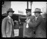 Police Chief Wilfred Spellman with stunt driver Hayward Thompson, Los Angeles, 1927