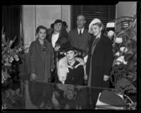 Newly elected Supervisor Herbert C. Legg with his family in his office, Los Angeles, 1934