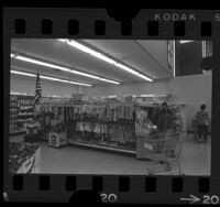 People shopping in the clothing section of a supermarket in Los Angeles, Calif., 1964