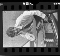 Burt Blum displaying his recalled personalized license plate reading "UP URZ2" Calif., 1973