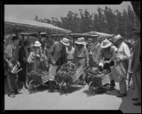 Farmers with produce at the Los Angeles Farmers' Market at 3rd ...