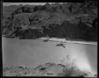 Colorado River, with barges preparing for construction of Parker Dam, near Parker (Arizona), 1934