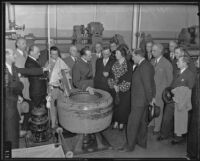 Asst. Jailer C. A. Fitzgerald leads 1935 Grand Jury on tour of laundry room at County Jail, Los Angeles, 1935