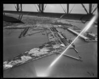 Channels, wharves, and warehouses, Los Angeles Harbor, San Pedro, aerial view, [1930s?]